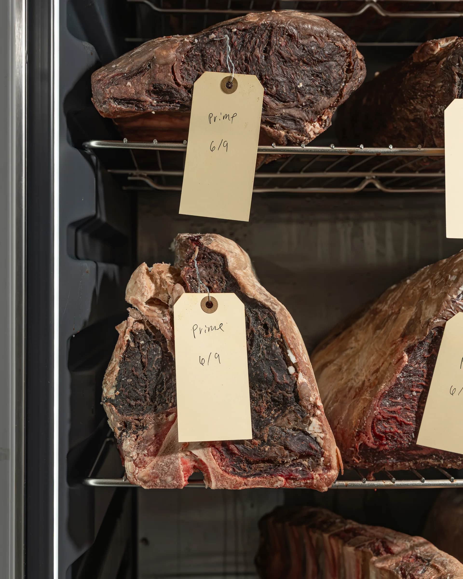 Tagged dry-aged porterhouse on the rail