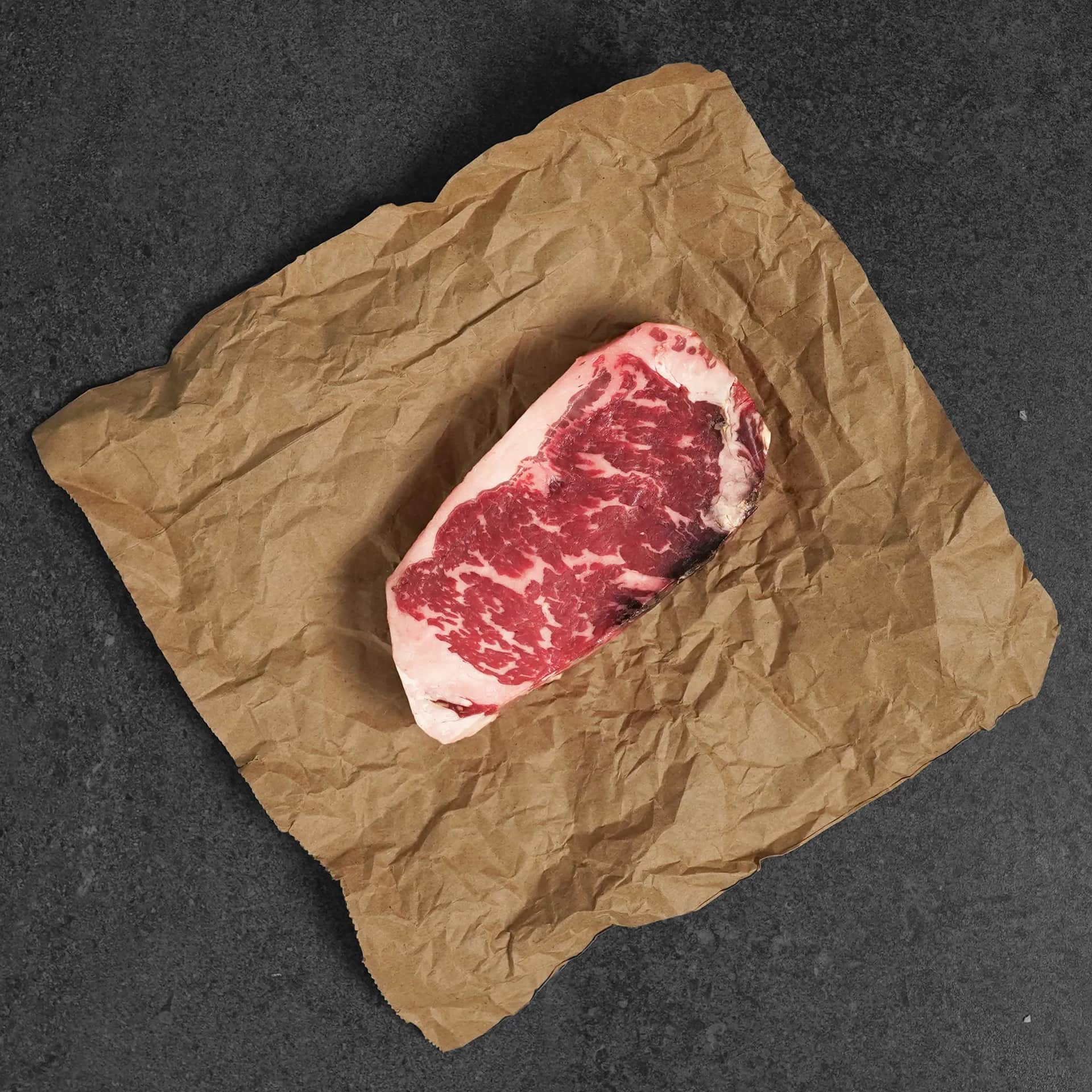 60-day dry-aged strip steak