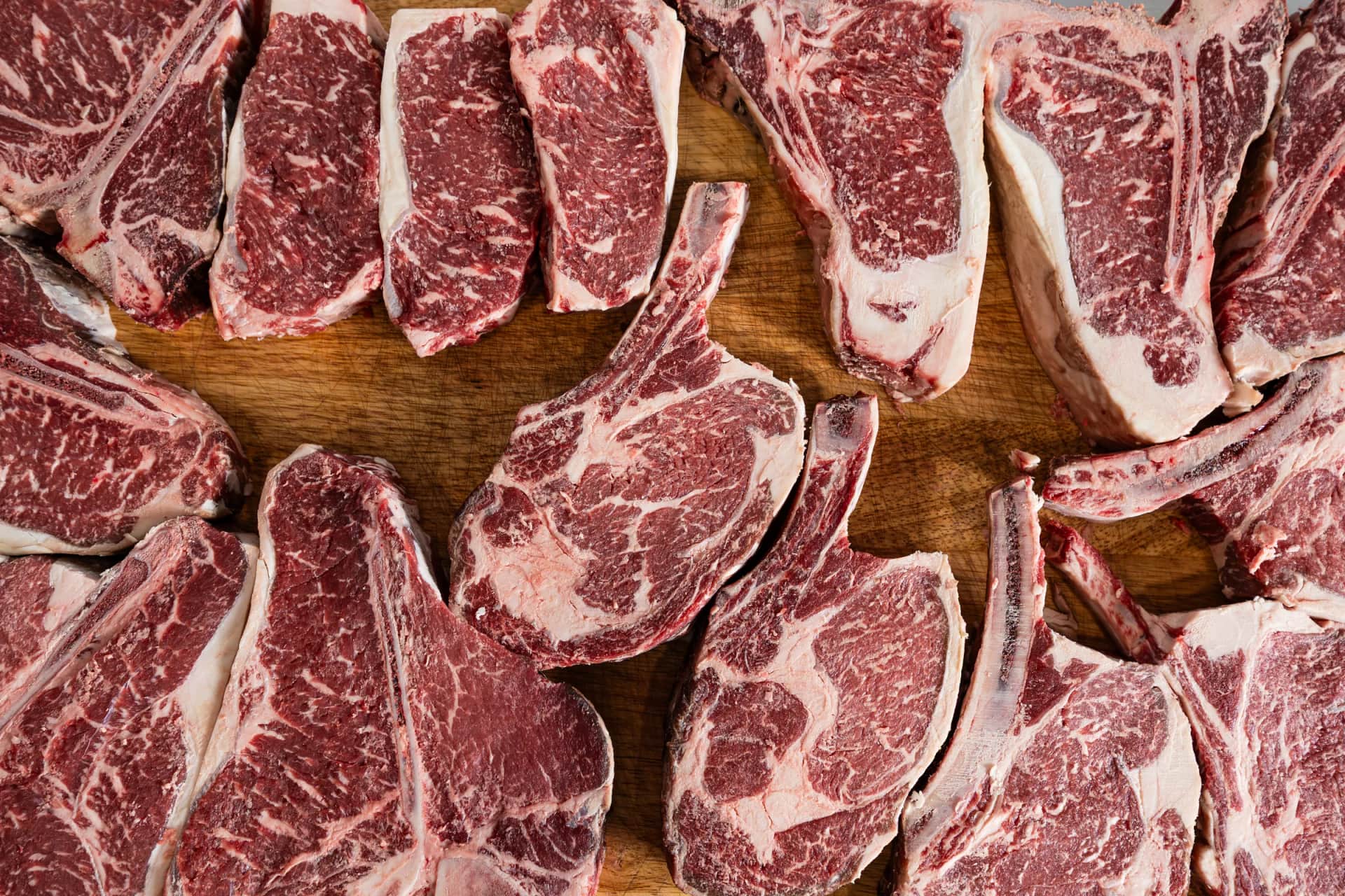Overhead spread of ribeye and tomahawk chops